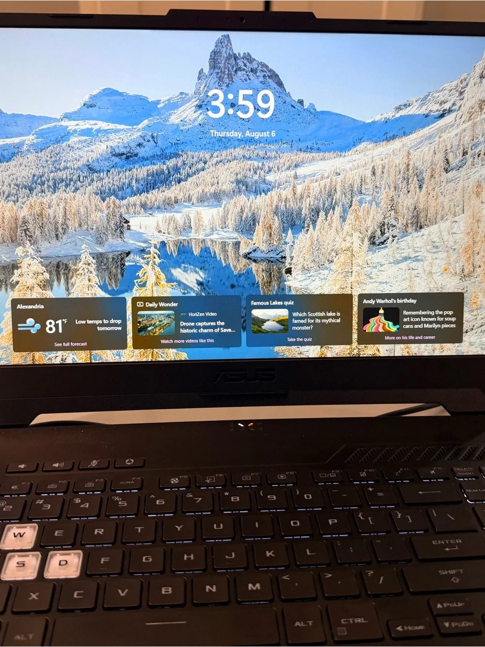 ASUS Black Gaming Laptop with Cyberpunk Display